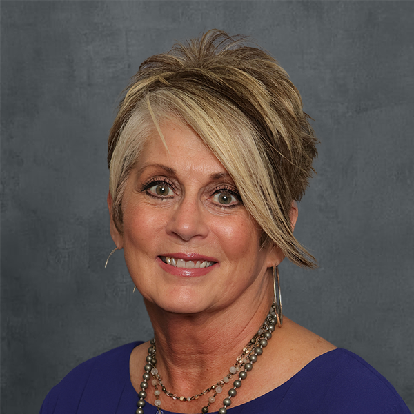 Smiling woman with stylish haircut