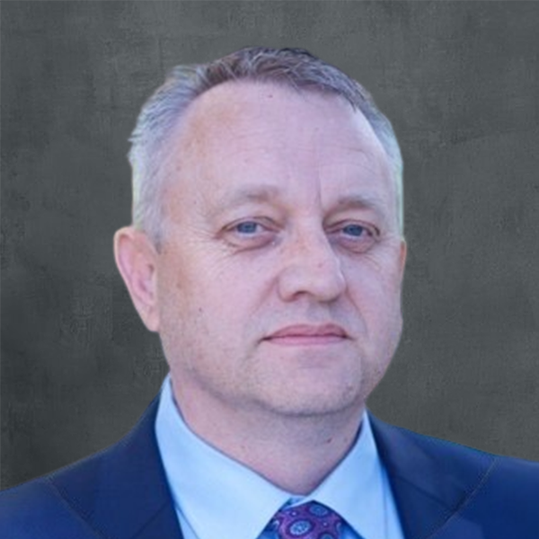 Man in suit with neutral expression