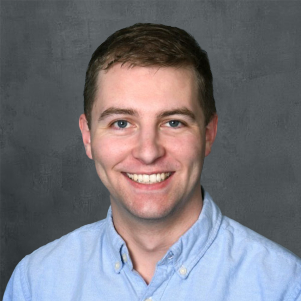Smiling young man in blue shirt
