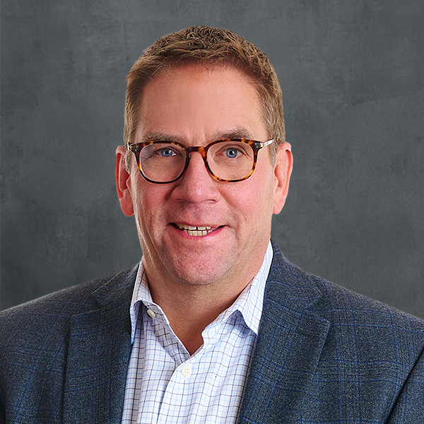 Man with glasses and blazer