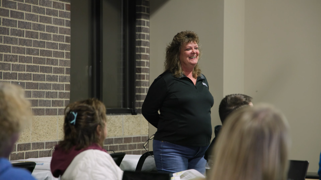 Woman smiling during a meeting