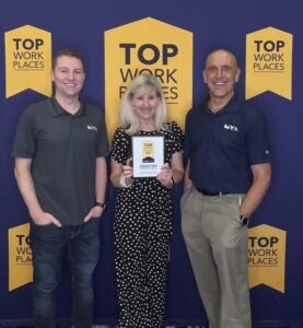 MYA employees receving the Top Worplace Award at ceremony
