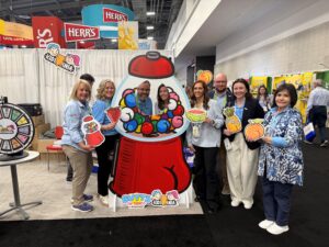 MYA team members at the Kidsmania booth at the Sweets & Snacks Expo